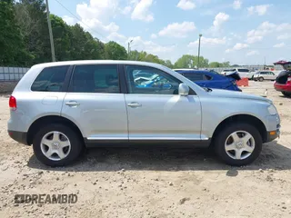 2007 Volkswagen Touareg V6 z VIN WVGZE77L57D000964, wystawiony jako IAAI lot #42159667 z przebiegiem 143 542 mil mil oraz . Historia ofert i sprzedaży dostępna na DreamBid. Obrazek 13.