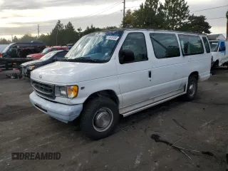 1999 Ford Econoline Passenger XL with VIN 1FBSS31L2XHA95612, listed as a Copart auction lot 72615104 with 211,283 mi miles and Salvage Title. Bid and sale history available at DreamBid. Image 1.