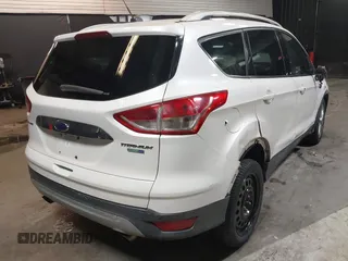 2016 Ford Escape Titanium with VIN 1FMCU9J94GUB02810, listed as a IAAI auction lot 41643907 with 119,684 mi miles. Bid and sale history available at carsss.com. Image 4.