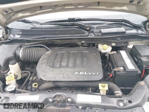 2013 Chrysler Town & Country Limited with VIN 2C4RC1GG2DR536256, listed as a IAAI auction lot 42027427 with 126,447 mi miles. Bid and sale history available at carsss.com. Image 10.
