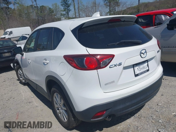 2013 Mazda CX-5 Touring with VIN JM3KE2CE0D0119032, listed as a IAAI auction lot 41891556 with 174,745 mi miles and . Bid and sale history available at carsss.com. Image 3.