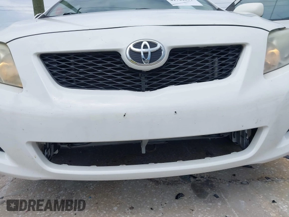 2009 Toyota Corolla with VIN JTDBL40E599027710, listed as a IAAI auction lot 42744831 with 112,043 mi miles and . Bid and sale history available at DreamBid. Image 6.