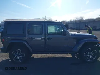 2024 Jeep Wrangler Willys z VIN 1C4RJXN60RW293872, wystawiony jako IAAI lot #41908133 z przebiegiem 850 mil mil oraz . Historia ofert i sprzedaży dostępna na DreamBid. Obrazek 13.