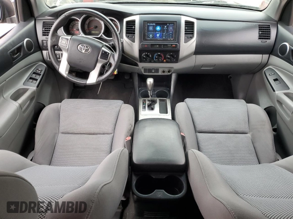 2013 Toyota Tacoma PreRunner with VIN 3TMJU4GN9DM141945, listed as a Copart auction lot 64747625 with 130,793 mi miles and Salvage title. Bid and sale history available at DreamBid. Image 8.
