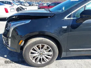 2018 Cadillac XT5 FWD with VIN 1GYKNARS5JZ235585, listed as a IAAI auction lot 41607440 with 77,220 mi miles and . Bid and sale history available at DreamBid. Image 20.