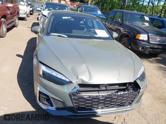 2024 Audi A5 Sportback S line Premium Plus z VIN WAUFACF52RA050222, wystawiony jako IAAI lot #42135082 z przebiegiem 36 607 mil mil oraz . Historia ofert i sprzedaży dostępna na DreamBid. Obrazek 13.