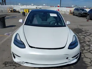 2020 Tesla Model 3 Standard Range Plus with VIN 5YJ3E1EA4LF805205, listed as a IAAI auction lot 41850744 with Not Provided miles. Bid and sale history available at carsss.com. Image 11.