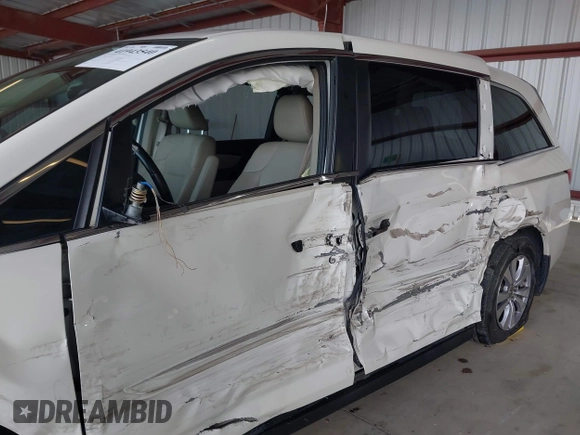 2015 Honda Odyssey EX-L with VIN 5FNRL5H64FB084175, listed as a IAAI auction lot 41943540 with 67,902 mi miles and . Bid and sale history available at carsss.com. Image 6.
