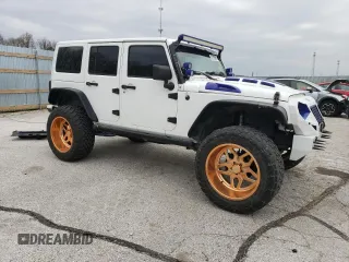 2017 Jeep Wrangler Unlimited Sport with VIN 1C4BJWDGXHL634930, listed as a Copart auction lot 52780985 with 74,873 mi miles and Salvage Title. Bid and sale history available at carsss.com. Image 4.
