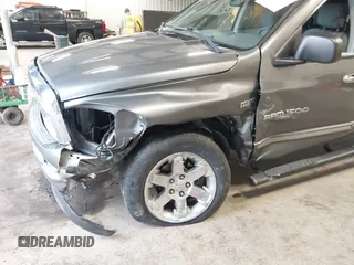 2006 Dodge 1500 SLT with VIN 1D7HU18216S617848, listed as a IAAI auction lot 41919979 with 97,133 mi miles and . Bid and sale history available at DreamBid. Image 6.