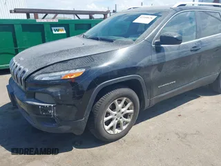 2015 Jeep Cherokee Latitude with VIN 1C4PJMCS3FW545440, listed as a IAAI auction lot 42268676 with 197,192 mi miles and . Bid and sale history available at DreamBid. Image 6.