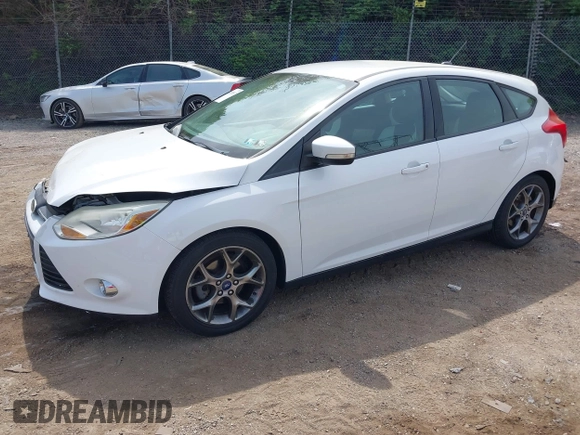 2014 Ford Focus SE with VIN 1FADP3K25EL251024, listed as a IAAI auction lot 42123157 with 74,311 mi miles and . Bid and sale history available at carsss.com. Image 2.