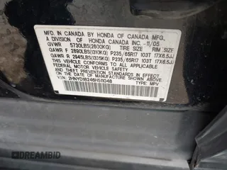 2006 Acura MDX with VIN 2HNYD18246H511048, listed as a IAAI auction lot 41722844 with 242,393 mi miles. Bid and sale history available at carsss.com. Image 9.