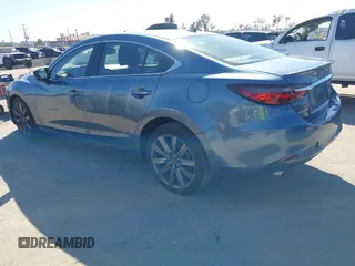 2018 Mazda 6 Grand Touring with VIN JM1GL1TY4J1333021, listed as a IAAI auction lot 41818719 with 56,188 mi miles and . Bid and sale history available at DreamBid. Image 3.