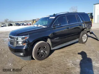 2020 Chevrolet Tahoe LT with VIN 1GNSKBKC1LR248352, listed as a Copart auction lot 82865274 with 73,765 mi miles and Salvage Title. Bid and sale history available at carsss.com. Image 1.