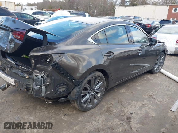 2018 Mazda Mazda6 Touring with VIN JM1GL1VM5J1309174, listed as a IAAI auction lot 41730175 with 107,423 mi miles. Bid and sale history available at carsss.com. Image 4.