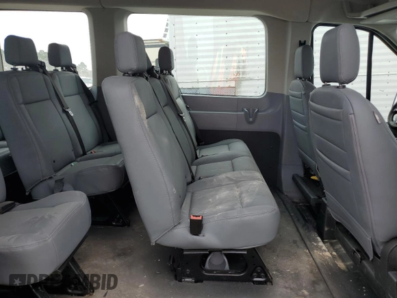 2018 Ford Transit Passenger XL z VIN 1FBAX2CM6JKA67593, wystawiony jako Copart lot #46419645 z przebiegiem 27 491 mil mil oraz Szkody całkowita. Historia ofert i sprzedaży dostępna na DreamBid. Obrazek 11.