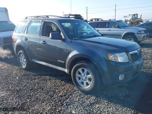 2008 Mazda Tribute Touring with VIN 4F2CZ96168KM05738, listed as a IAAI auction lot 41403675 with 217,593 mi miles. Bid and sale history available at carsss.com. Image 1.