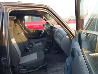 2009 Ford Ranger XL with VIN 1FTZR15E79PA68856, listed as a IAAI auction lot 41784829 with 153,928 mi miles. Bid and sale history available at carsss.com. Image 5.