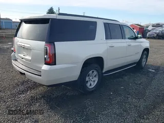 2015 GMC Yukon XL SLT with VIN 1GKS2HKC3FR586338, listed as a IAAI auction lot 41632662 with 149,133 mi miles. Bid and sale history available at carsss.com. Image 4.