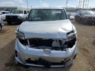 2012 Scion xB with VIN JTLZE4FE1CJ009084, listed as a Copart auction lot 50447785 with 74,155 mi miles and Salvage Title. Bid and sale history available at carsss.com. Image 5.