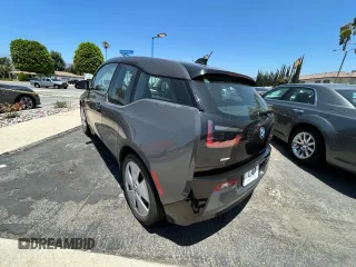 2014 BMW i3 with VIN WBY1Z4C51EV274633, listed as a Copart auction lot 64677185 with 61,664 mi miles and Clean title. Bid and sale history available at DreamBid. Image 3.