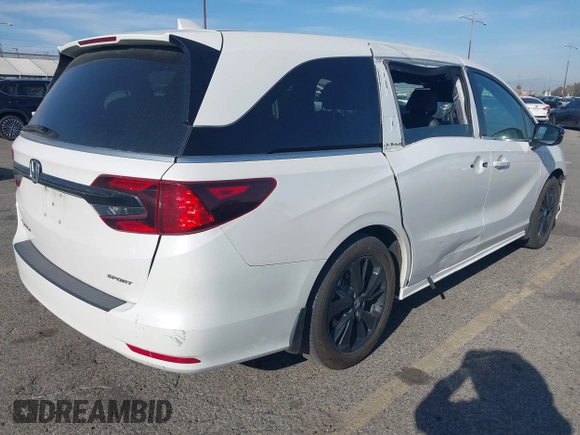 2023 Honda Odyssey Sport z VIN 5FNRL6H77PB011088, wystawiony jako IAAI lot #41883596 z przebiegiem 80 528 mil mil oraz . Historia ofert i sprzedaży dostępna na DreamBid. Obrazek 4.