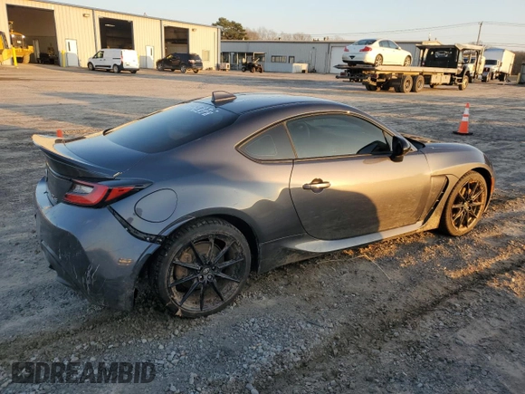 2024 Toyota GR86 Premium with VIN JF1ZNBE17R9751729, listed as a Copart auction lot 86863454 with 11,909 mi miles and Salvage Title. Bid and sale history available at carsss.com. Image 3.