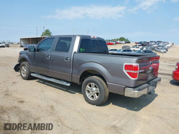 2014 Ford F-150 XL with VIN 1FTFW1CF2EKF75517, listed as a IAAI auction lot 40534480 with 121,035 mi miles. Bid and sale history available at carsss.com. Image 3.