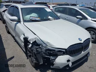2021 BMW 3 Series 330i z VIN 3MW5R1J02M8C06736, wystawiony jako IAAI lot #42159657 z przebiegiem Nie podano mil oraz . Historia ofert i sprzedaży dostępna na DreamBid. Obrazek 1.