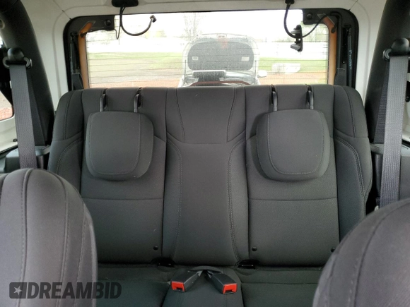 2021 Jeep Wrangler Sport z VIN 1C4GJXAN5MW668474, wystawiony jako Copart lot #53238095 z przebiegiem Nie podano mil oraz Szkody całkowita. Historia ofert i sprzedaży dostępna na DreamBid. Obrazek 10.