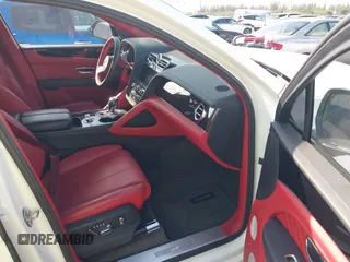2022 Bentley Bentayga V8 z VIN SJAAM2ZV2NC013035, wystawiony jako IAAI lot #41487773 z przebiegiem 35 500 mil mil oraz . Historia ofert i sprzedaży dostępna na DreamBid. Obrazek 5.