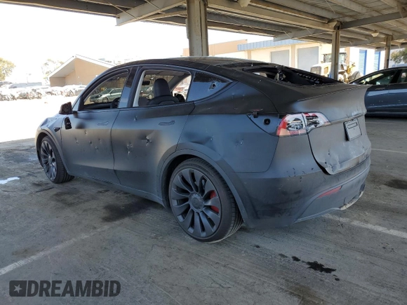 2024 Tesla Model Y Performance z VIN 7SAYGDEFXRF037934, wystawiony jako Copart lot #52126255 z przebiegiem 27 366 mil mil oraz Szkoda całkowita • Salvage title. Historia ofert i sprzedaży dostępna na DreamBid. Obrazek 2.