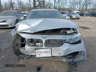 2015 BMW 4 Series 428i xDrive with VIN WBA3N9C53FK247985, listed as a IAAI auction lot 41395534 with 76,856 mi miles and . Bid and sale history available at DreamBid. Image 12.