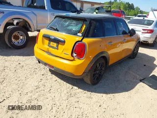 2016 MINI Hardtop 4 Door with VIN WMWXU1C58G2D08712, listed as a IAAI auction lot 42038278 with 96,874 mi miles and . Bid and sale history available at DreamBid. Image 4.