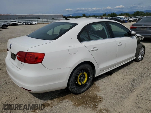 2014 Volkswagen Jetta SE with VIN 3VWD17AJ2EM391314, listed as a Copart auction lot 57357575 with 131,968 mi miles and Salvage title. Bid and sale history available at DreamBid. Image 3.