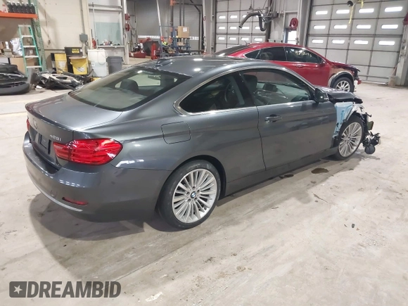 2014 BMW 4 Series 428i xDrive with VIN WBA3N9C56EF721564, listed as a IAAI auction lot 41737409 with 42,052 mi miles and . Bid and sale history available at DreamBid. Image 4.