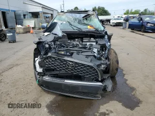 2023 Toyota Corolla Cross XLE with VIN 7MUDAABG4PV070998, listed as a Copart auction lot 56869585 with Not provided miles and Non repairable. Bid and sale history available at DreamBid. Image 5.