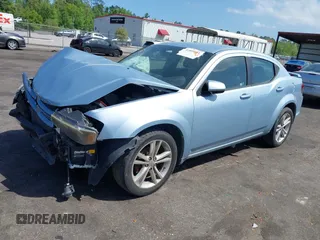 2013 Dodge Avenger SXT with VIN 1C3CDZCB0DN521591, listed as a IAAI auction lot 41891451 with 100,234 mi miles and . Bid and sale history available at carsss.com. Image 2.