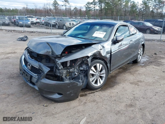 2009 Honda Accord Cpe EX with VIN 1HGCS12739A019304, listed as a IAAI auction lot 41728355 with 136,191 mi miles. Bid and sale history available at carsss.com. Image 17.