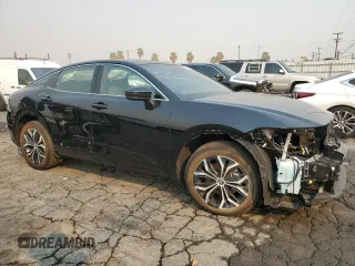 2023 Toyota Crown XLE with VIN JTDAAAAF3P3016714, listed as a Copart auction lot 70643914 with 10,721 mi miles and Salvage Title. Bid and sale history available at carsss.com. Image 4.
