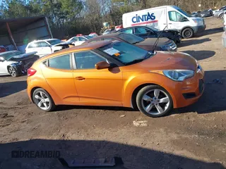2013 Hyundai Veloster w/Gray Int with VIN KMHTC6AD3DU126193, listed as a IAAI auction lot 41251982 with 119,066 mi miles. Bid and sale history available at carsss.com. Image 13.