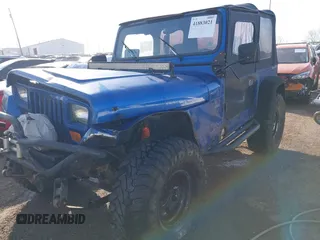 1995 Jeep Wrangler S with VIN 1J4FY19P3SP260597, listed as a IAAI auction lot 41883021 with 176,555 mi miles. Bid and sale history available at carsss.com. Image 17.