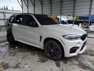 2015 BMW X5 M with VIN 5YMKT6C55F0C89468, listed as a Copart auction lot 75391074 with 0 mi miles and Salvage Title. Bid and sale history available at carsss.com. Image 4.