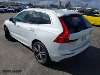 2019 Volvo XC60 Momentum with VIN LYV102DK8KB255769, listed as a IAAI auction lot 41573224 with 45,249 mi miles. Bid and sale history available at carsss.com. Image 3.