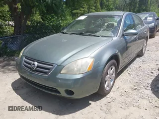 2002 Nissan Altima S z VIN 1N4AL11D02C147963, wystawiony jako IAAI lot #42318252 z przebiegiem 203 894 mil mil oraz . Historia ofert i sprzedaży dostępna na DreamBid. Obrazek 2.