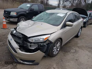 2017 Ford Focus SE with VIN 1FADP3F28HL252411, listed as a IAAI auction lot 41888738 with 103,981 mi miles. Bid and sale history available at carsss.com. Image 2.