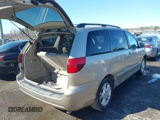 2005 Toyota Sienna XLE with VIN 5TDZA22C95S365448, listed as a IAAI auction lot 41552969 with 214,462 mi miles and . Bid and sale history available at DreamBid. Image 4.