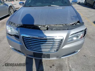 2014 Chrysler 300 C with VIN 2C3CCAKG3EH212936, listed as a IAAI auction lot 40921649 with 153,000 mi miles and . Bid and sale history available at carsss.com. Image 6.