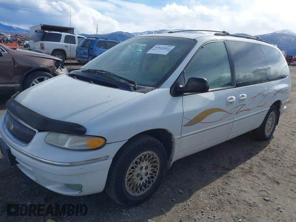 1997 Chrysler Town & Country with VIN 1C4GT64L7VB436658, listed as a IAAI auction lot 41823587 with 184,570 mi miles and . Bid and sale history available at DreamBid. Image 2.